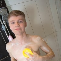 Cute boy in the shower - Picture 7