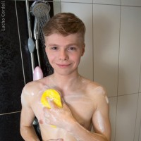 Cute boy in the shower - Picture 8