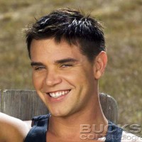 Guy Parker posing outdoors - Picture 1