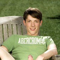 Cute twink posing on a lawn - Picture 6