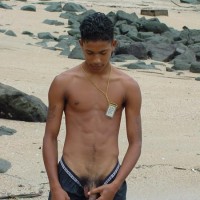 Two cute twinks at the beach - Picture 1