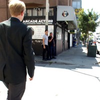 Two thugs drag a businessman into a porn shop - Picture 1