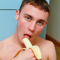 Cute gay boy masturbates eating a banana - Picture 9