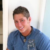 Sexy stud Tate grabs cock - Picture 1
