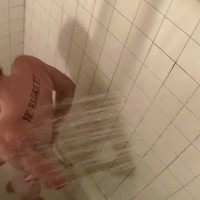 Scottie hosing down in the tub - Picture 15