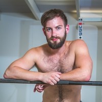 Bearded gay have sex in a gym - Picture 1