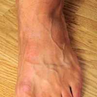 Joe show his musles and feet - Picture 38