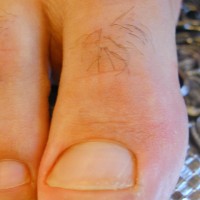 Ridgeway show his feet - Picture 33