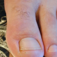 Ridgeway show his feet - Picture 34