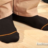 Eric shows off his socks - Picture 18
