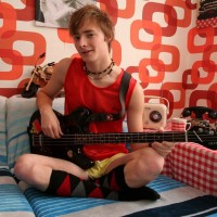 Paddy posing in 70s retro style room - Picture 1