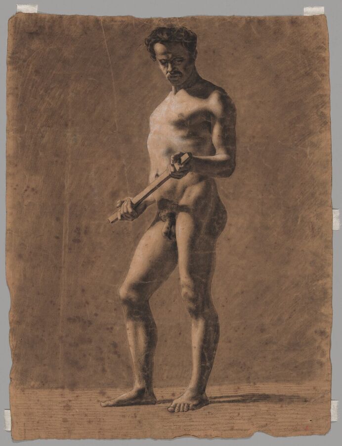 Charcoal drawing of a standing naked man holding a wooden stick in both hands