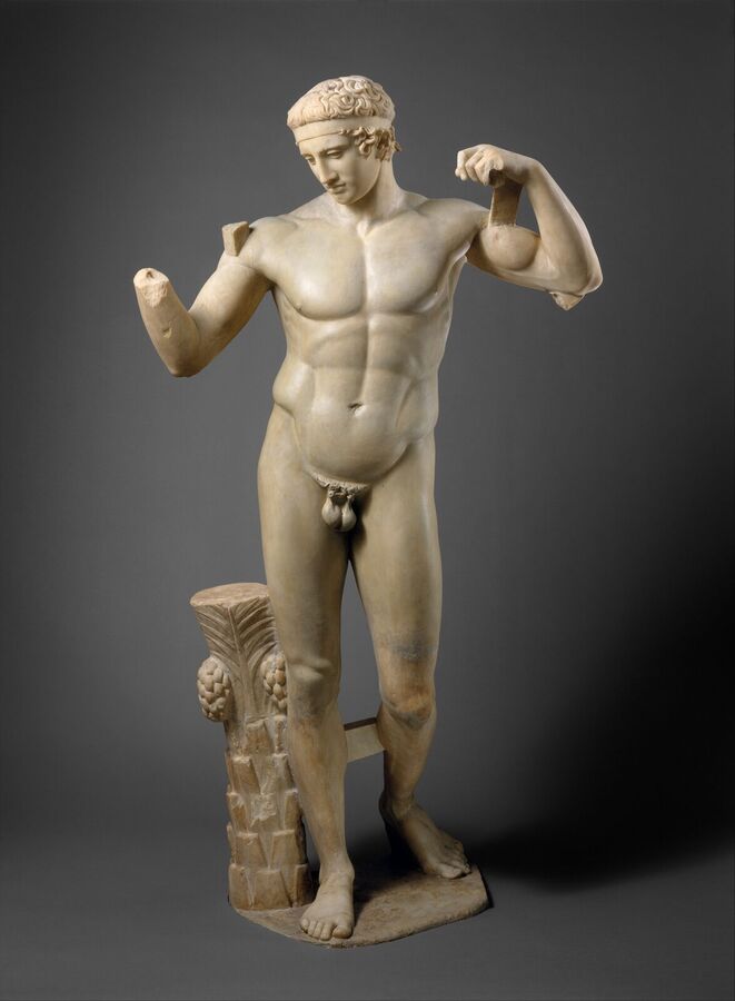 Marble statue of a naked athlete with both arms raised to tie a ribbon round his head, partly reconstructed