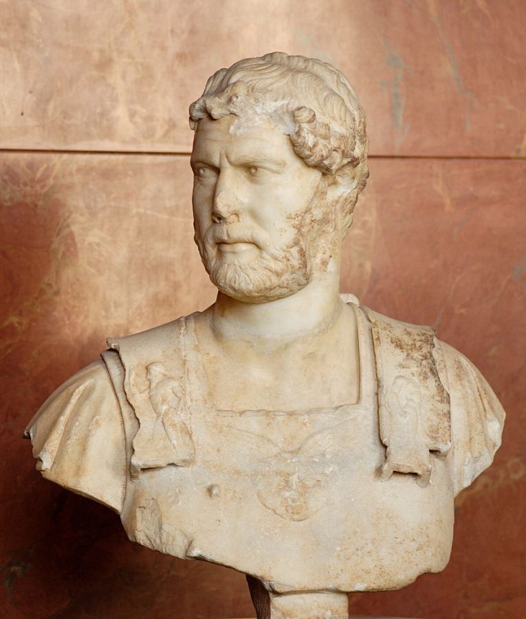 Marble bust of a bearded Roman man with curly hair, wearing a cuirass decorated with a small Gorgon head